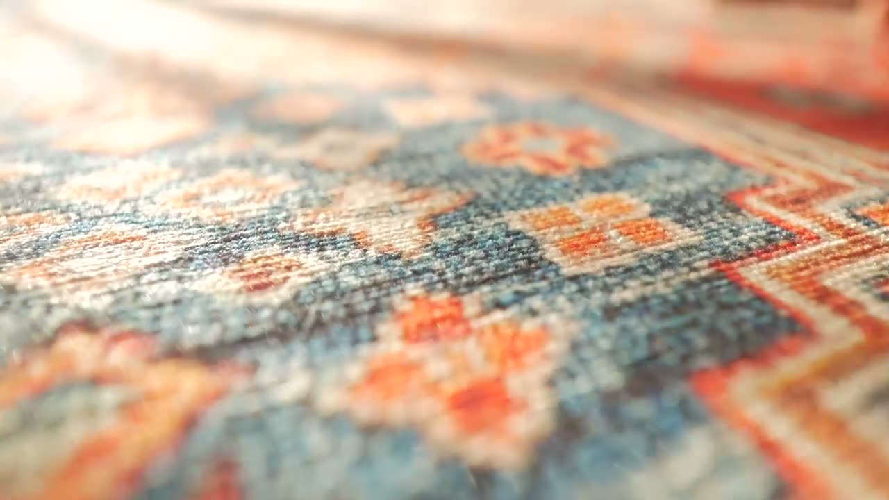 Close-up of knots being tied on the loom